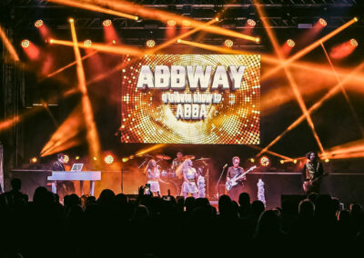 ABBWAY drummer performing live during The ABBA Concert Experience